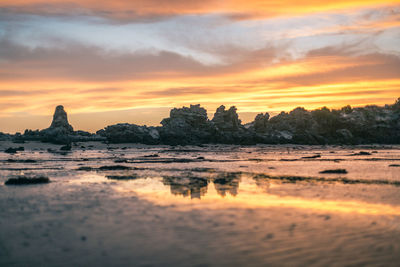 Scenic view of sea against sky during sunset