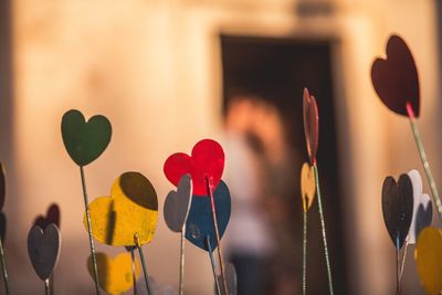 Close-up of toys against heart shape