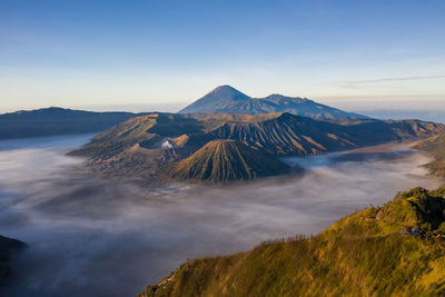 Scenic view of volcanic mountain against sky