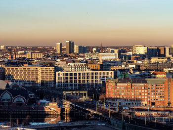 High angle view of buildings against sky during sunset