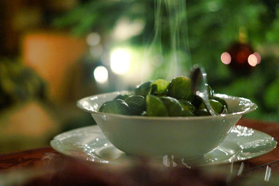 Close-up of brussels sprout in bowl on table