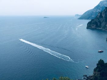 High angle view of sea shore against sky