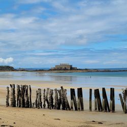 Scenic view of beach against sky