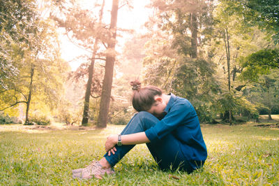 Woman sitting in park