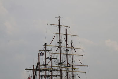 Low angle view of sailboat in sea against sky