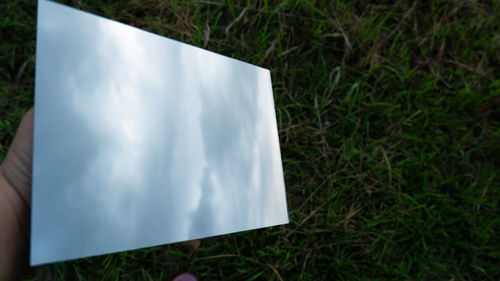 High angle view of paper on field