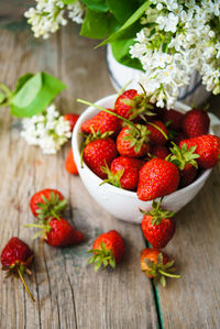 High angle view of strawberries on table