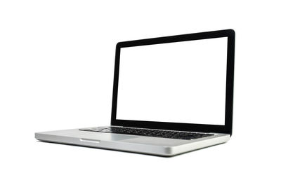Close-up of laptop on table against white background
