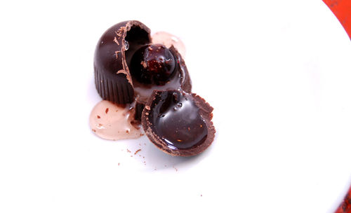 Close-up of ice cream over white background