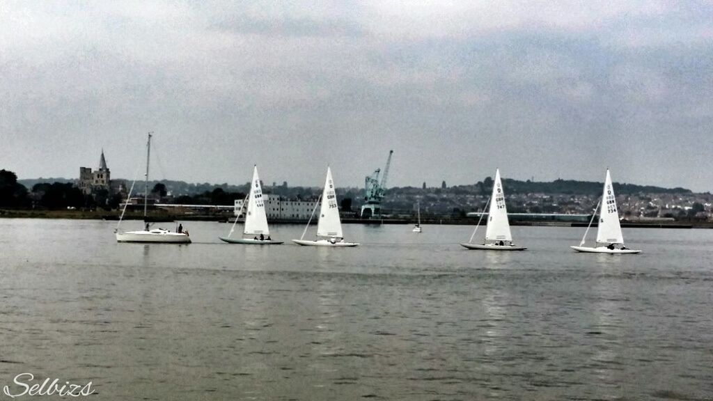 nautical vessel, water, transportation, boat, mode of transport, sea, sky, waterfront, moored, cloud - sky, sailboat, tranquility, tranquil scene, cloudy, cloud, nature, harbor, rippled, day, scenics