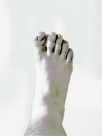 Close-up of human hand against white background