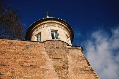 Low angle view of building against blue sky