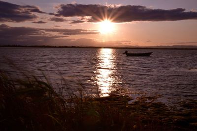 Scenic view of sunset over river