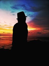 Silhouette of man standing on beach