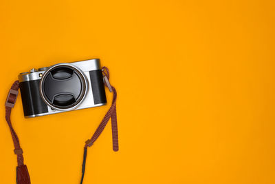 Close-up of camera against black background