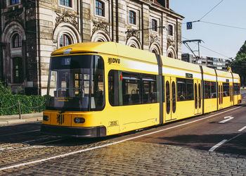 Train on railroad track in city