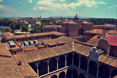 High angle view of old building in city against sky