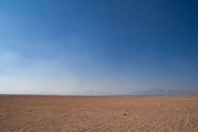 Scenic view of desert against sky