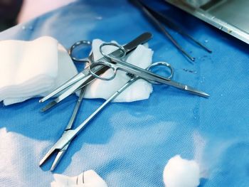 High angle view of medical instrument on table