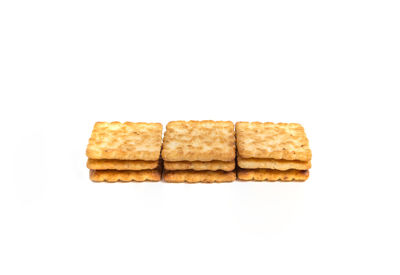 Close-up of bread against white background