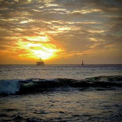 Scenic view of sea at sunset