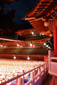 Low angle view of illuminated building at night