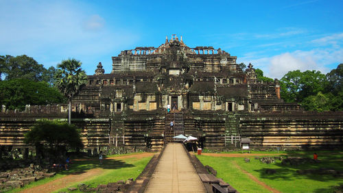 View of temple against cloudy sky