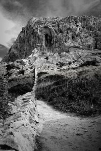Rock formations on landscape against sky