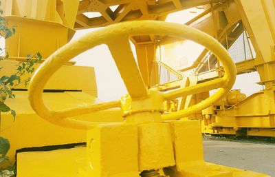 Close-up of yellow machine