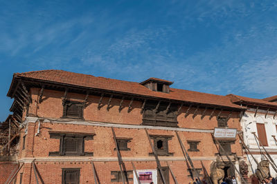 Low angle view of old building against sky