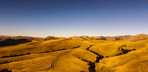Scenic view of landscape against clear sky