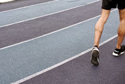 Low section of man running