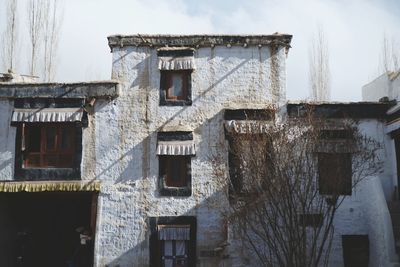 Low angle view of old building against sky