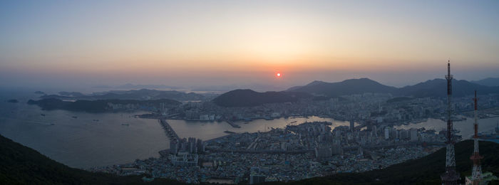 High angle view of buildings against sky during sunset