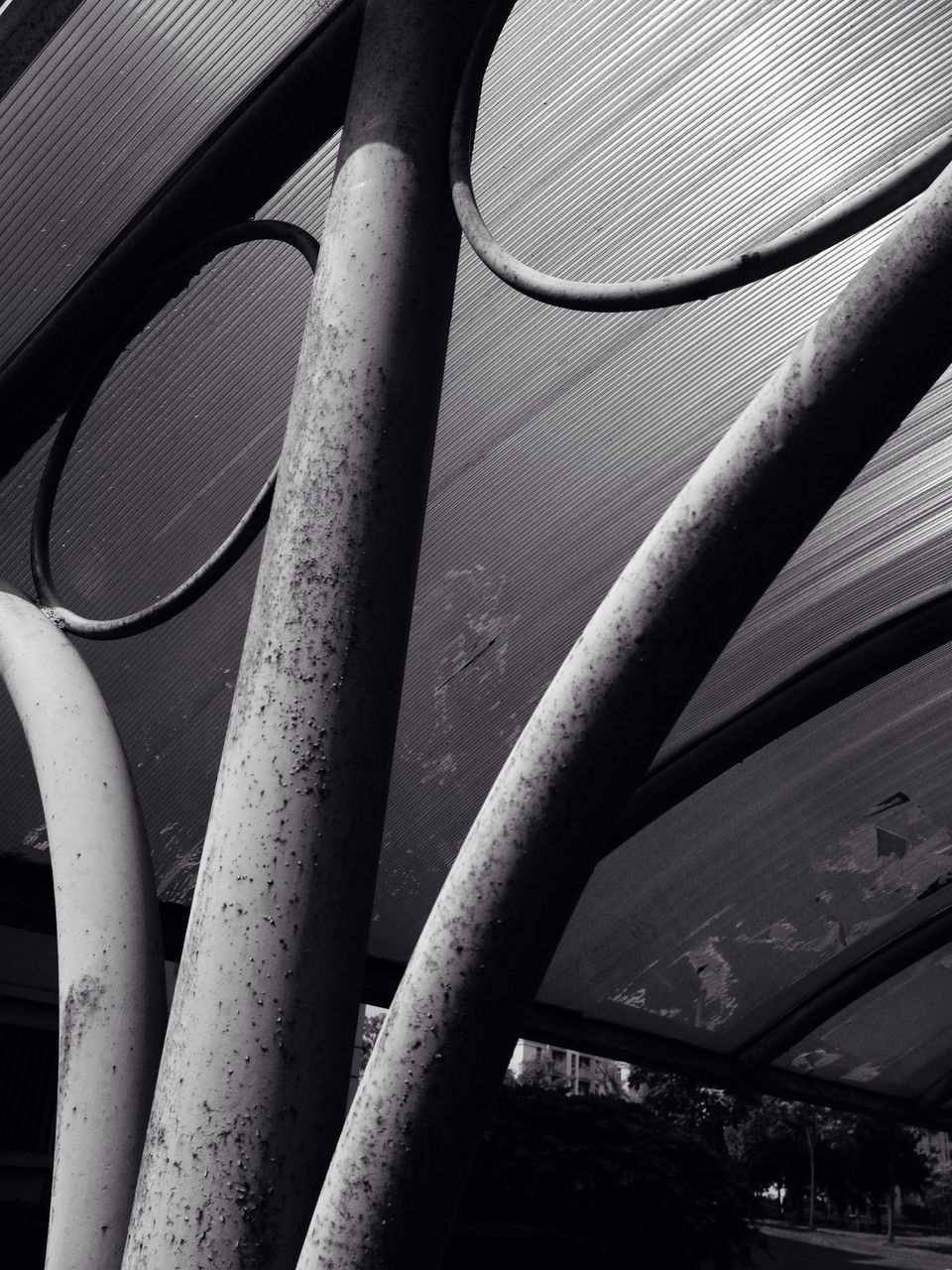 metal, built structure, low angle view, architecture, railing, transportation, indoors, metallic, spiral, connection, staircase, no people, part of, modern, engineering, day, close-up, steps and staircases, spiral staircase, pattern