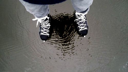 Low section of woman in water