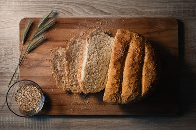 High angle view of bread on cutting board