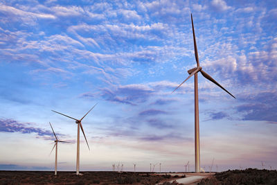 Wind farm in ft. davis, texas with colorful sky