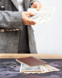 Close-up of woman holding book