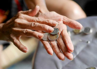 Woman hands holding coins