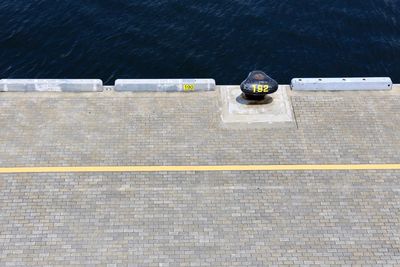 High angle view of bollard on pier