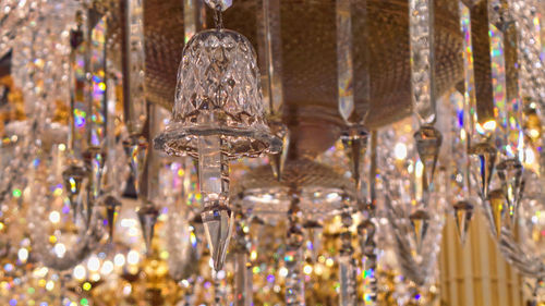 Close-up of illuminated lanterns hanging in temple