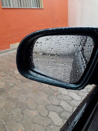 Close-up of wet car window