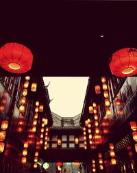 Low angle view of illuminated building at night