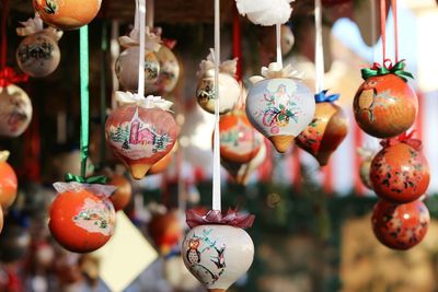 Close-up of decoration hanging for sale at market stall