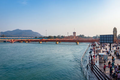 Ganges river bank with devotee crowed at evening from flat angle