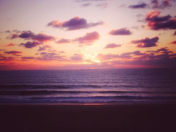 View of calm sea at sunset