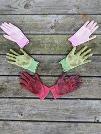 High angle view of pink umbrella on wooden table