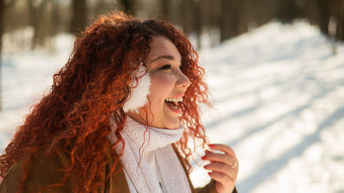 Young woman using mobile phone