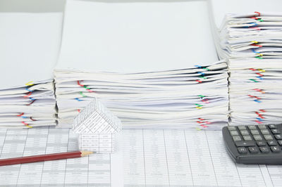 Close-up of calculator and documents